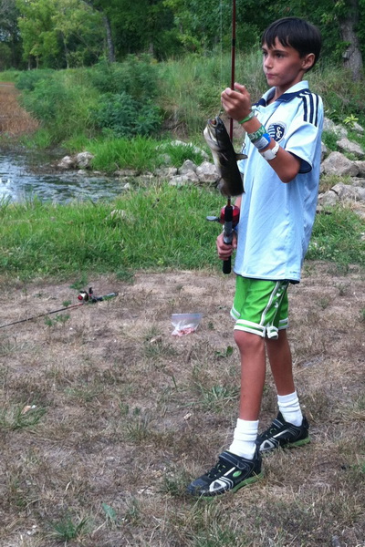 Nicholas catching a catfish